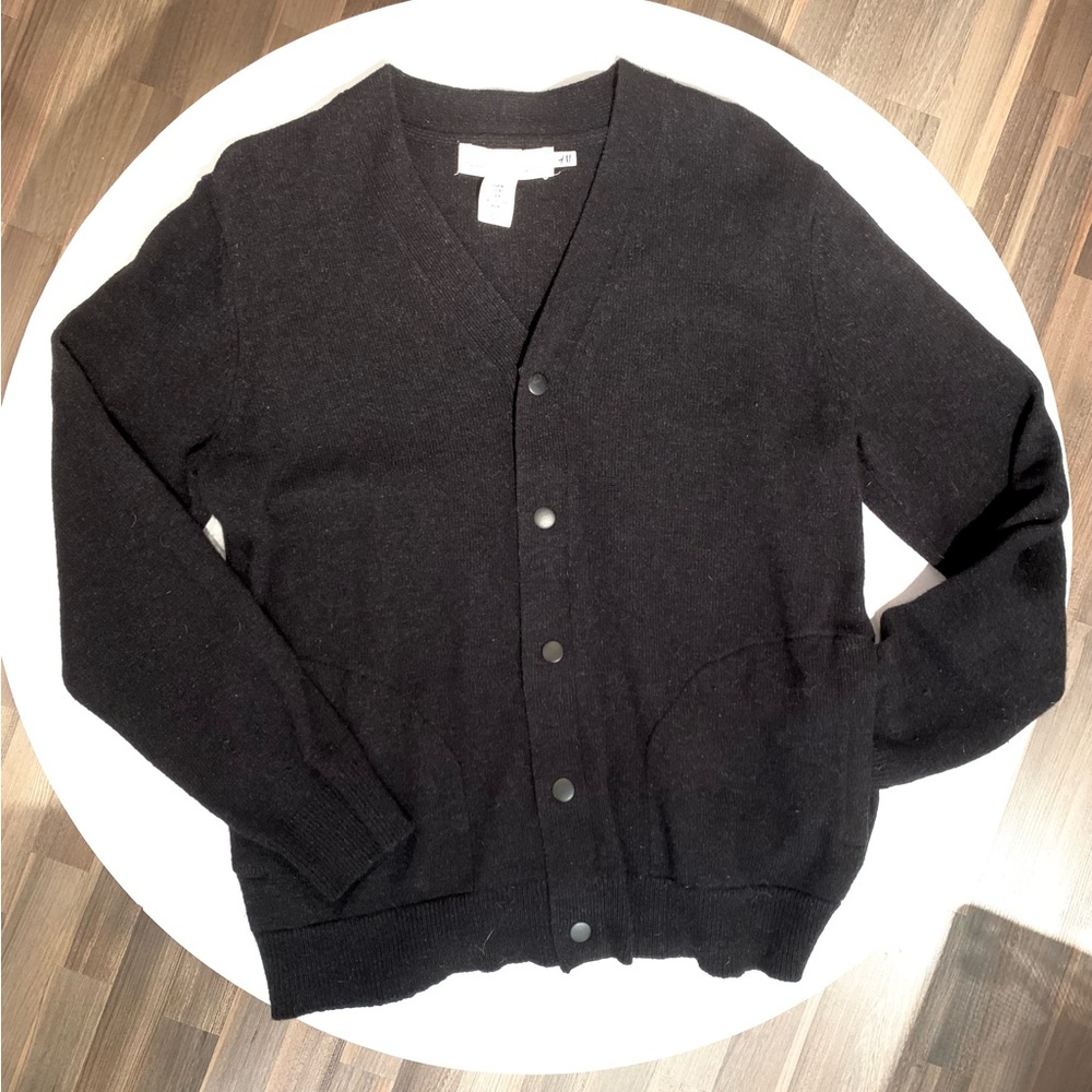 Men’s very black, medium size wool snap up sweater   .